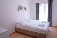 Postel nebo postele na pokoji v ubytování Amenity Apartmány Perná