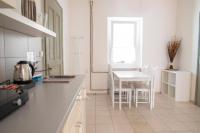 Kuchyň nebo kuchyňský kout v ubytování Amenity Apartmány Perná