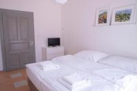 Postel nebo postele na pokoji v ubytování Amenity Apartmány Perná