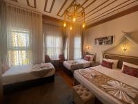 Postel nebo postele na pokoji v ubytování April Hotel