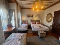 Postel nebo postele na pokoji v ubytování April Hotel