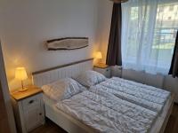 Postel nebo postele na pokoji v ubytování Apartmán u Rákosníčka