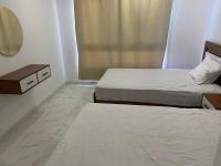 Postel nebo postele na pokoji v ubytování Fanadir Bay Resort & Aqua Escape