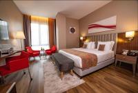 Postel nebo postele na pokoji v ubytování Ramada by Wyndham Istanbul Alibeykoy