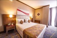 Postel nebo postele na pokoji v ubytování Ramada by Wyndham Istanbul Alibeykoy