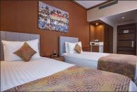 Postel nebo postele na pokoji v ubytování Ramada by Wyndham Istanbul Alibeykoy