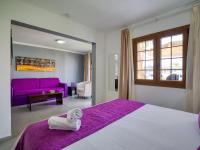 Postel nebo postele na pokoji v ubytování eó Suite Hotel Jardin Dorado