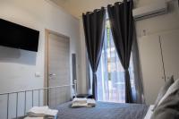 A bed or beds in a room at B&B Verga