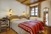 Postel nebo postele na pokoji v ubytování San Marsial Benasque Apart Hotel
