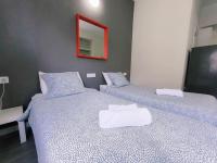 Postel nebo postele na pokoji v ubytování Apartamentos Carrillo 7