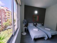 Postel nebo postele na pokoji v ubytování Apartamentos Carrillo 7