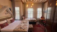 Postel nebo postele na pokoji v ubytování April Hotel