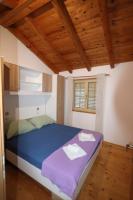 Postel nebo postele na pokoji v ubytování Apartments with parking spaces Borje, Peljesac - 12507