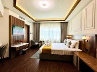 Postel nebo postele na pokoji v ubytování Fortune Plaza Hotel, Dubai Airport