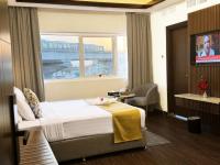 TV a/nebo společenská místnost v ubytování Fortune Plaza Hotel, Dubai Airport