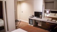 Postel nebo postele na pokoji v ubytování Sam Royal Hotel