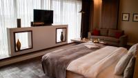 Postel nebo postele na pokoji v ubytování Sam Royal Hotel