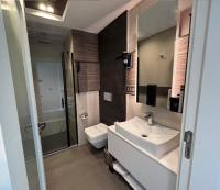 Koupelna v ubytování Sam Royal Hotel