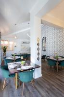 Un lugar para sentarse en Palm House Boutique Hotel and Spa