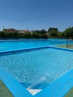 Bazén v ubytování Casa Les Roques nebo v jeho okolí
