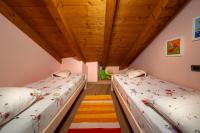 Posteľ alebo postele v izbe v ubytovaní Casa Monica Ledro Attico