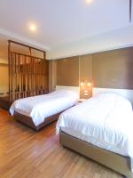 Postel nebo postele na pokoji v ubytování Huahin City View