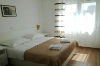 Posteľ alebo postele v izbe v ubytovaní Apartments by the sea Sukosan, Zadar - 5819