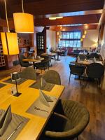 Un restaurant u otro lugar para comer en PLAZA INN Recklinghausen