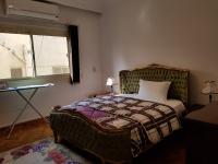 Postel nebo postele na pokoji v ubytování 3BR Cosy Apartment near 5A, New Cairo Families Only