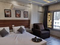 swiss hotel downtownにあるベッド