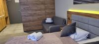 Posteľ alebo postele v izbe v ubytovaní Aparthotel Apartamenty Czarna Góra 224