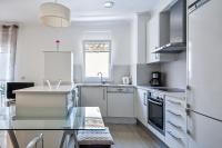 Kuchyňa alebo kuchynka v ubytovaní Apartamentos Sonido de Mar