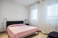 Posteľ alebo postele v izbe v ubytovaní Apartamentos Sonido de Mar