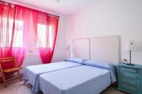 Posteľ alebo postele v izbe v ubytovaní Apartamentos Sonido de Mar