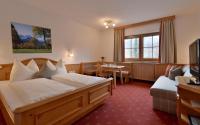 Posteľ alebo postele v izbe v ubytovaní Gästehaus Brantlhof Zimmer und Ferienwohnungen in Going am Wilden Kaiser