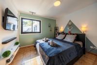 Łóżko lub łóżka w pokoju w obiekcie Bella Villa Piscine & jacuzzi