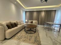 Posezení v ubytování Luxury apartment in new cairo lake view residence