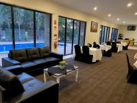 Χώρος καθιστικού στο The Palms Motel