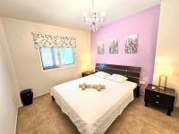Postel nebo postele na pokoji v ubytování Paphos Central Penthouse