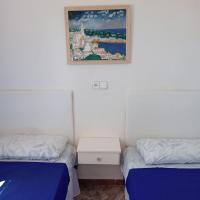 Postel nebo postele na pokoji v ubytování Beach & Flowers Free Parking