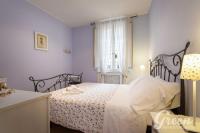 A bed or beds in a room at Green Apartments Rome