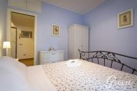 A bed or beds in a room at Green Apartments Rome