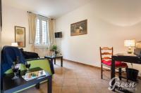 A television and/or entertainment centre at Green Apartments Rome