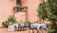 A restaurant or other place to eat at Green Apartments Rome