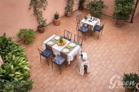 A garden outside Green Apartments Rome