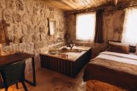 İsadora Cave Cappadociaにあるベッド