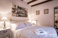 A bed or beds in a room at Green Apartments Rome