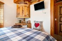 Posteľ alebo postele v izbe v ubytovaní Baita Chalet Alabama