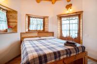 Posteľ alebo postele v izbe v ubytovaní Baita Chalet Alabama