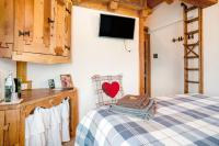 Posteľ alebo postele v izbe v ubytovaní Baita Chalet Alabama